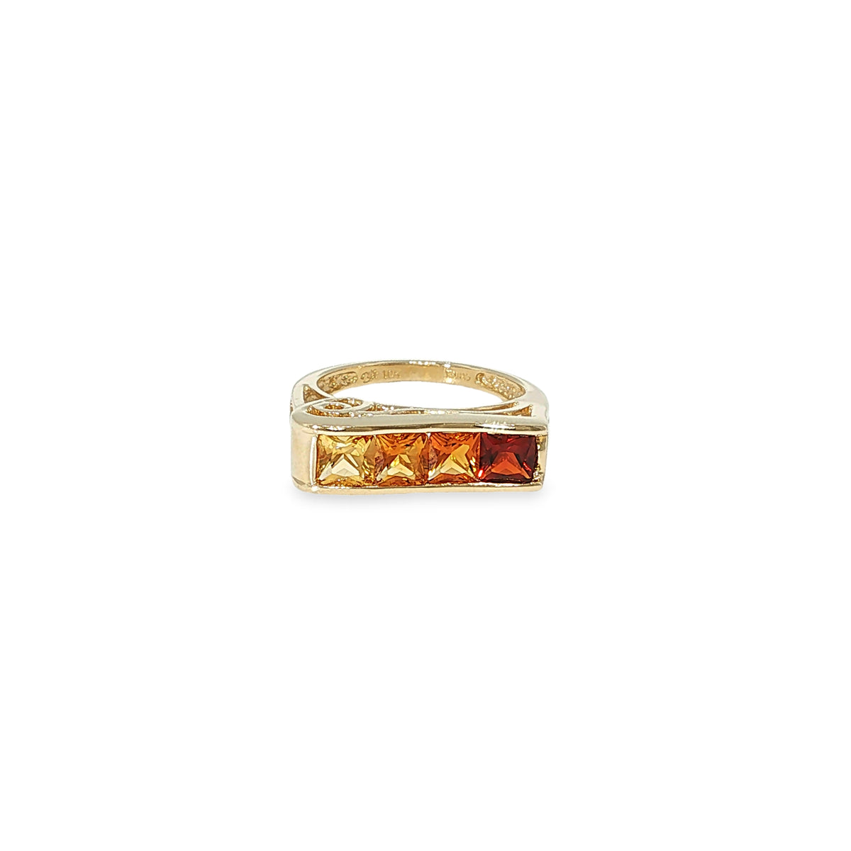 10K yellow gold ring with four princess-cut multi-tone citrines in a channel-style setting.