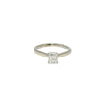 Natural radiant-cut diamond solitaire engagement ring in 14K white gold with a four-prong setting.