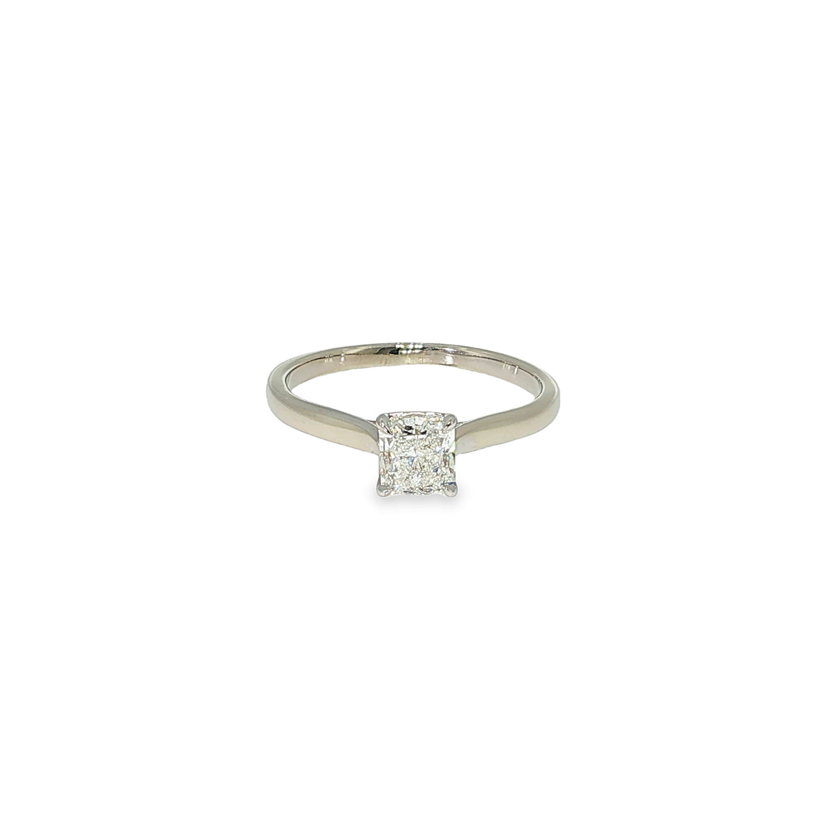 Natural radiant-cut diamond solitaire engagement ring in 14K white gold with a four-prong setting.