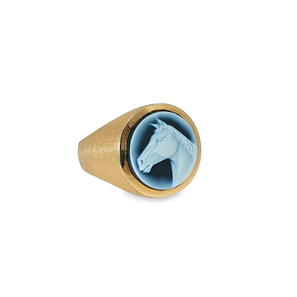 14K yellow gold ring with a round blue and white carved Wedgwood horsehead cameo.