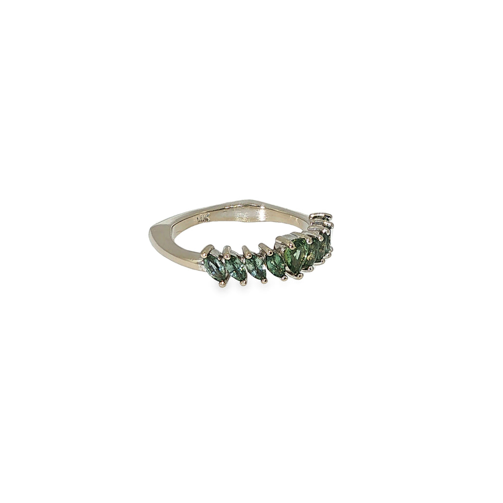14K white gold graduated band set with nine green Montana sapphires in mixed shapes.