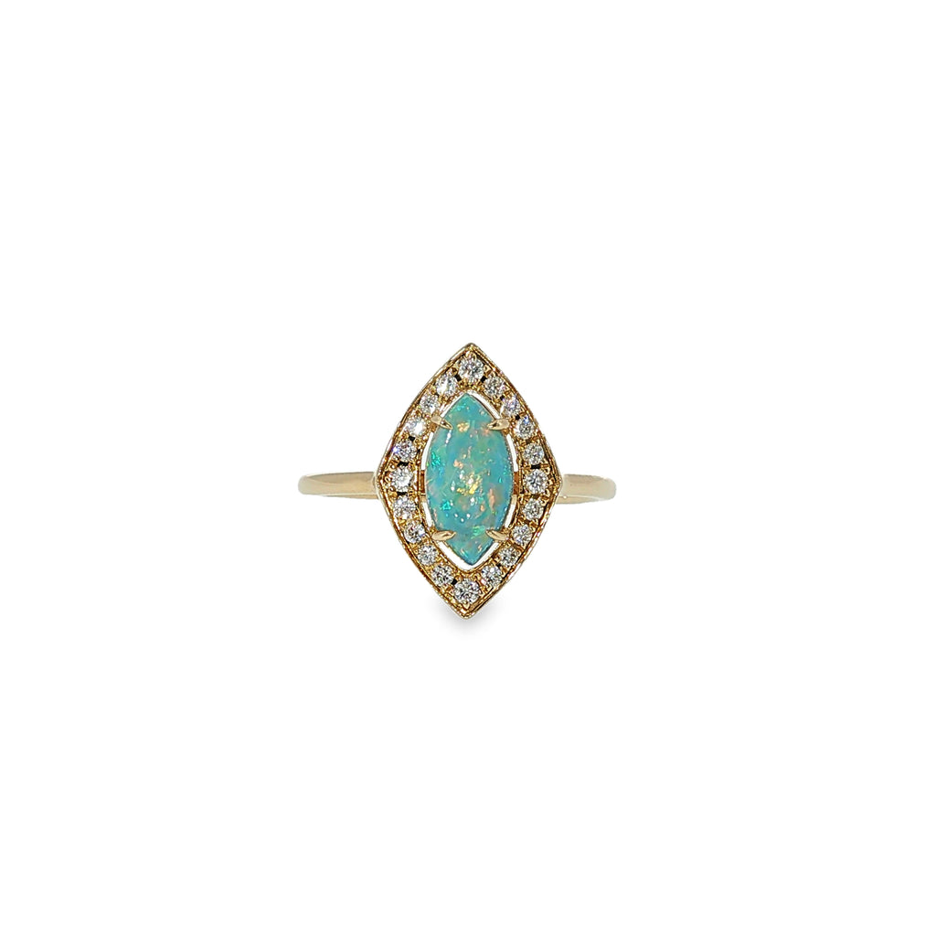 14K yellow gold ring with a marquise AAA opal surrounded by a diamond halo.