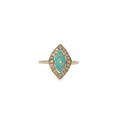 14K yellow gold ring with a marquise AAA opal surrounded by a diamond halo.