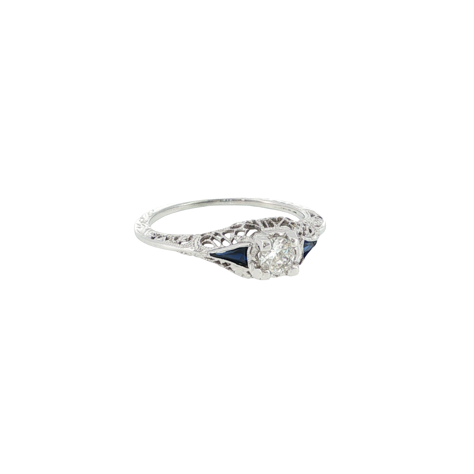 18K white gold vintage-style ring with an Old European cut diamond center and deep blue synthetic sapphire accents.