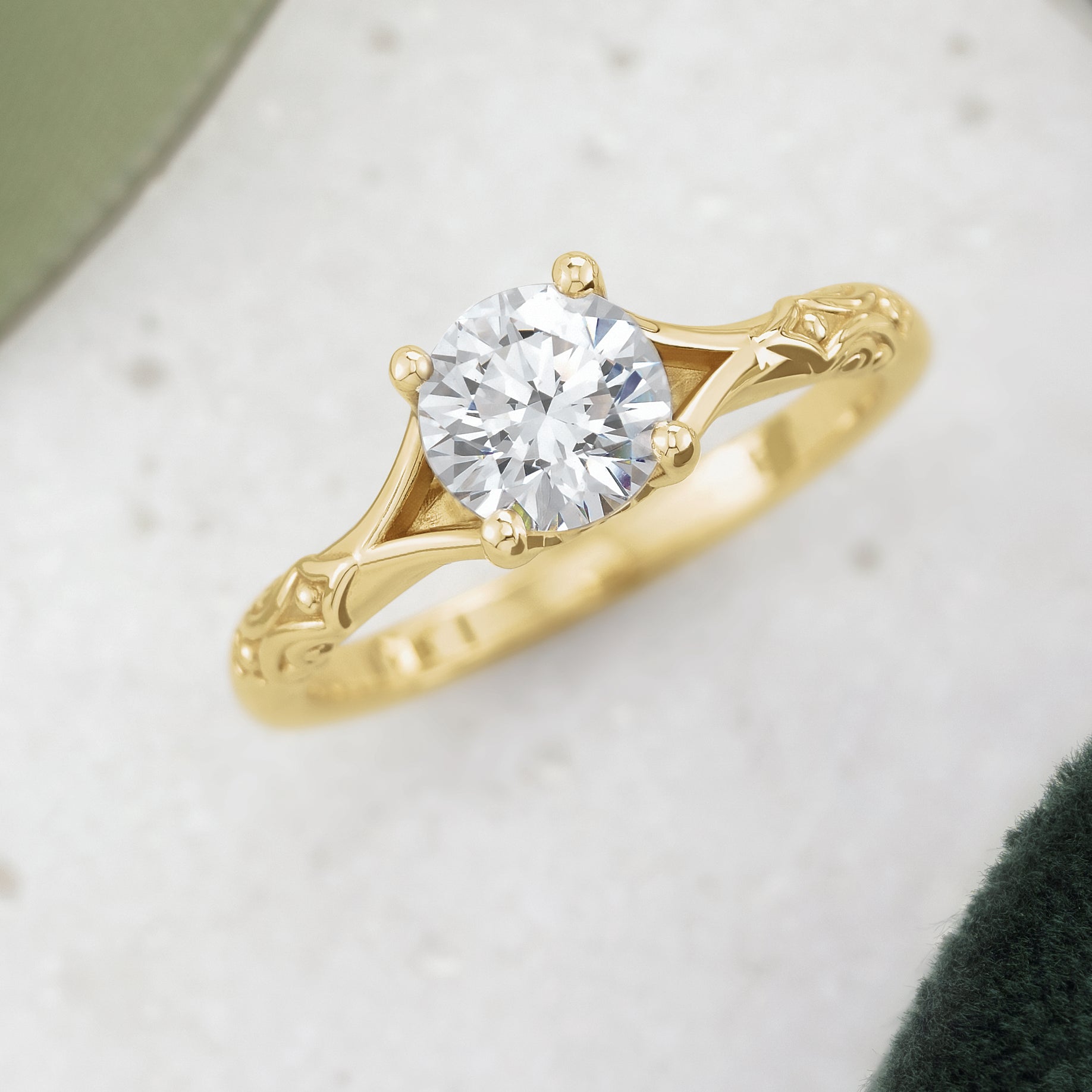 Yellow gold round diamond solitaire ring