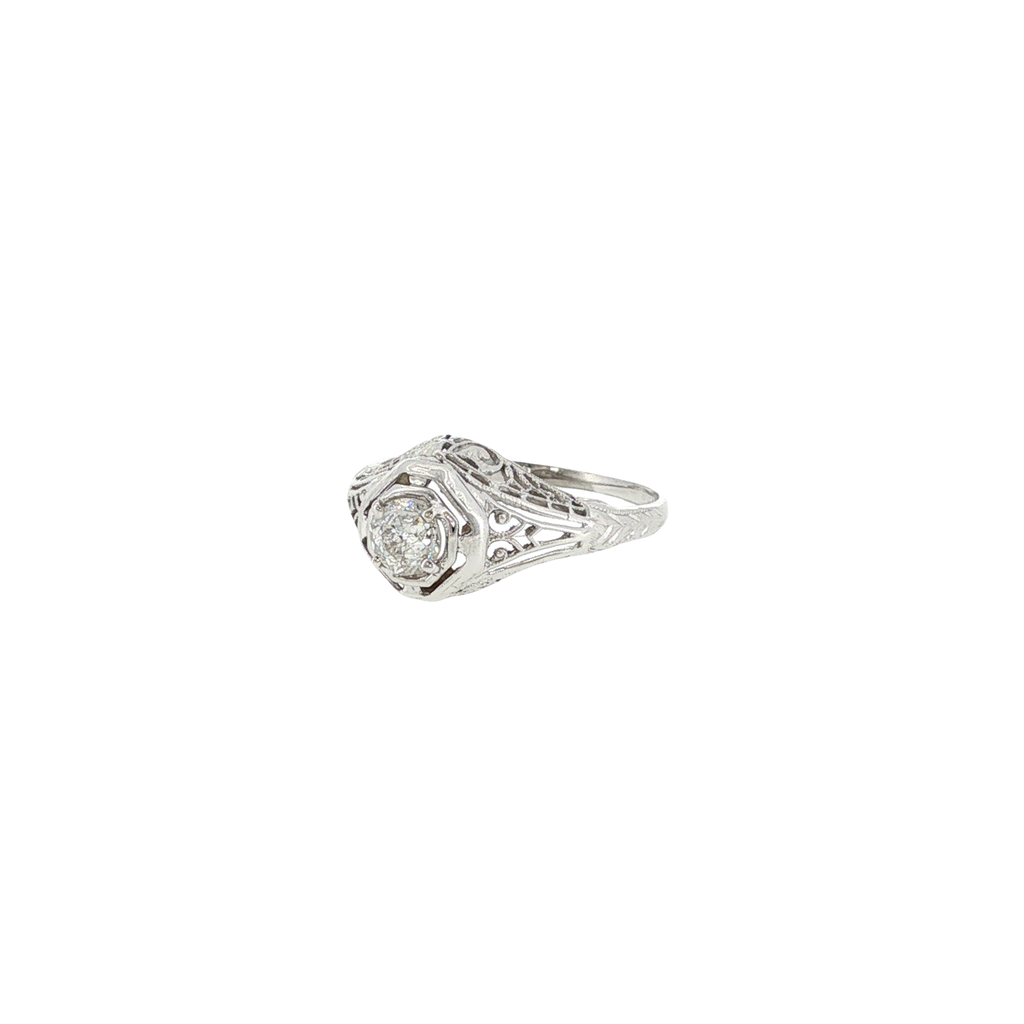 18K white gold filigree ring with an Old Mine cut diamond center and intricate vintage-inspired detailing.