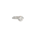 18K white gold Tacori ring with a round cubic zirconia center surrounded by diamond halo and setting accents.