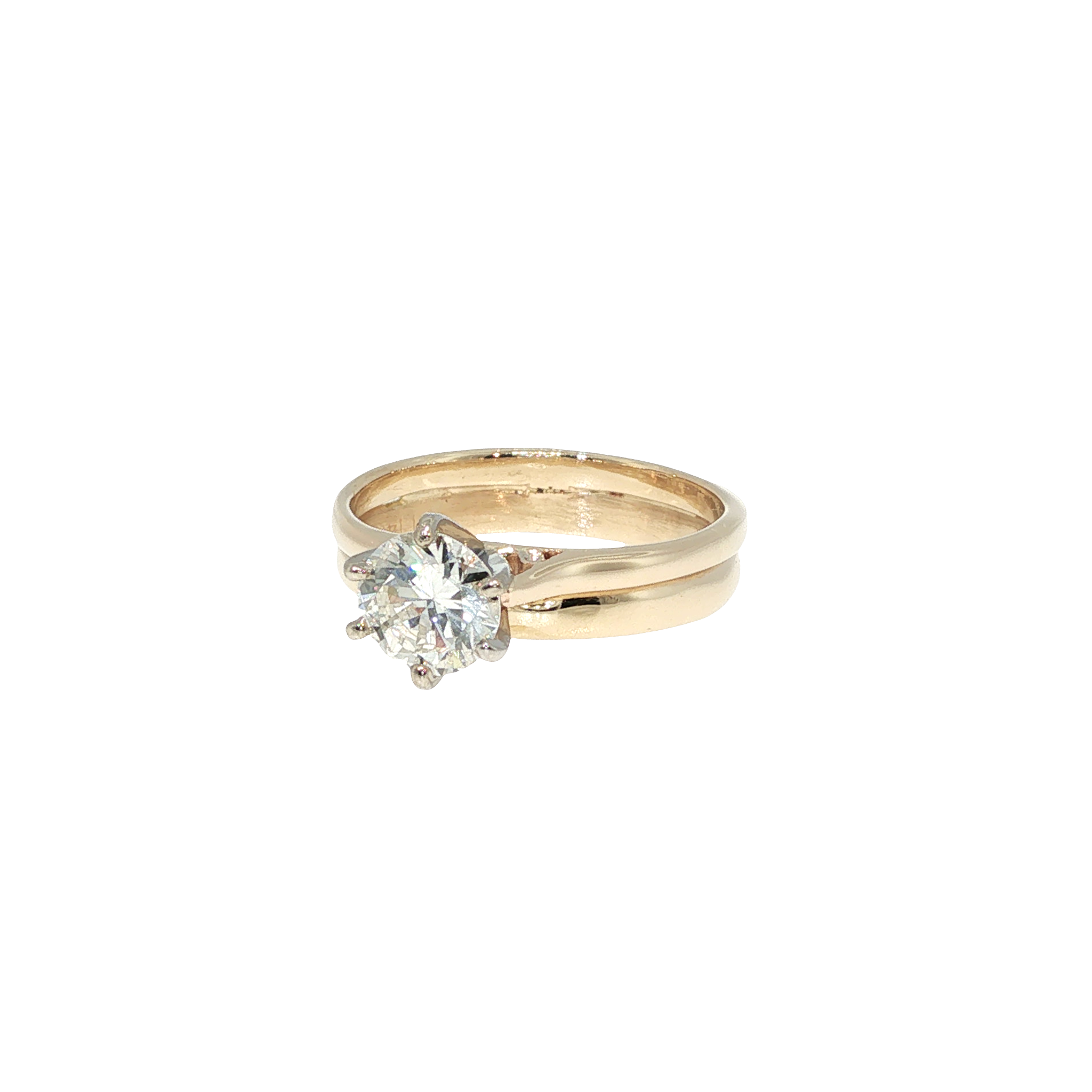 14K yellow gold cathedral bridal set with a round brilliant center diamond and matching soldered wedding band.