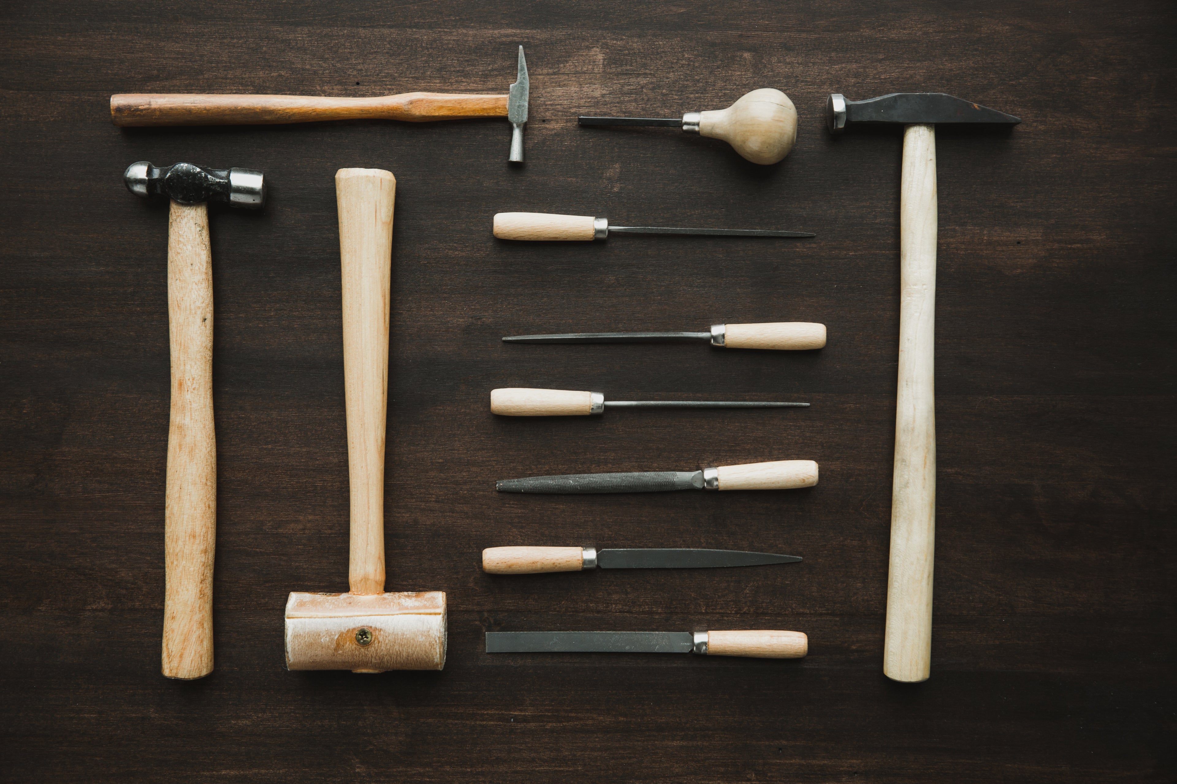 Jewelry files and hammers arranged for repair work