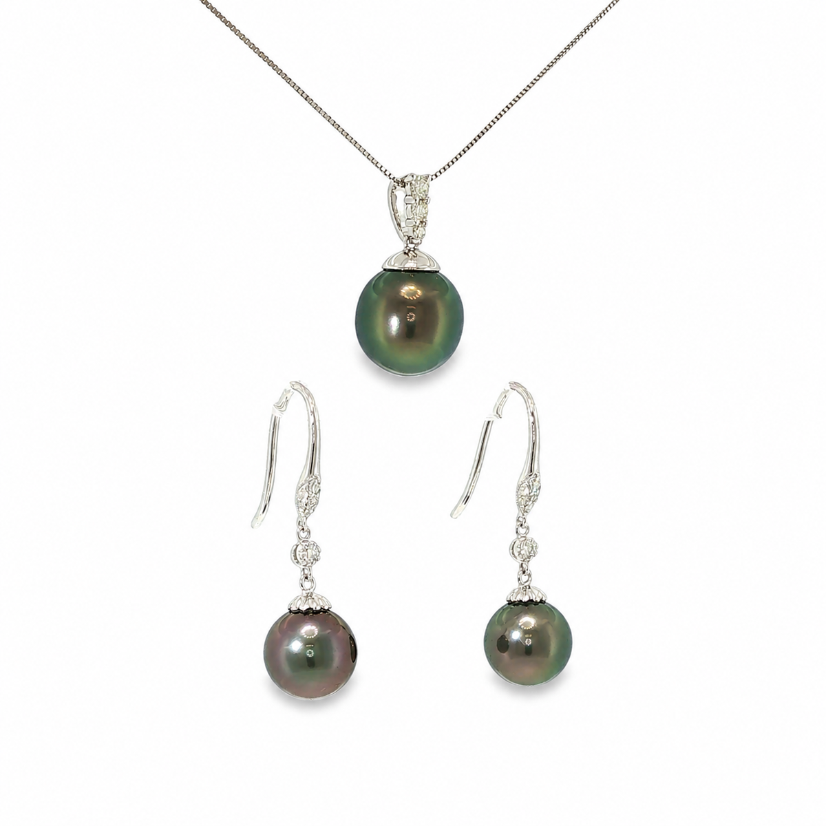 14K white gold matching pendant and drop earring set with dark iridescent Tahitian pearls and diamond accents.