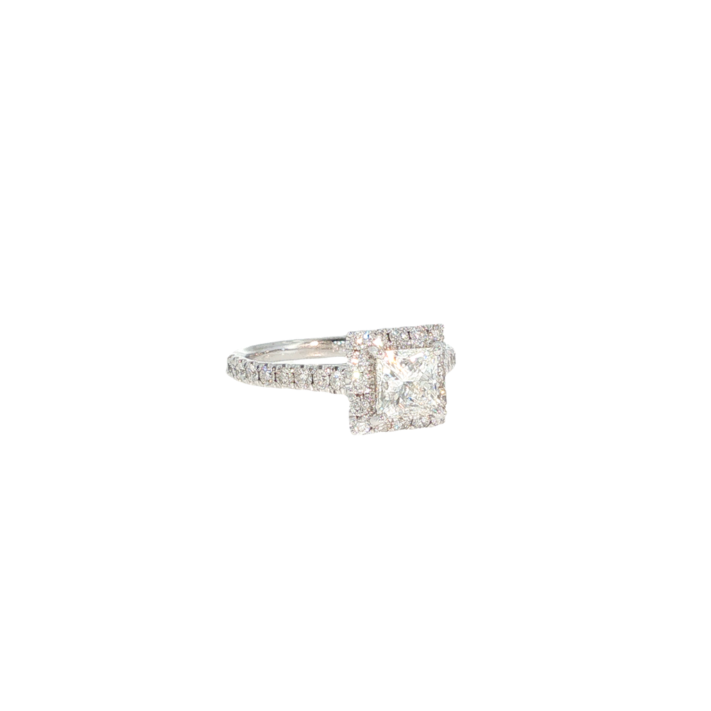 14K white gold halo ring with a princess-cut Leo diamond center and round brilliant diamond accents.