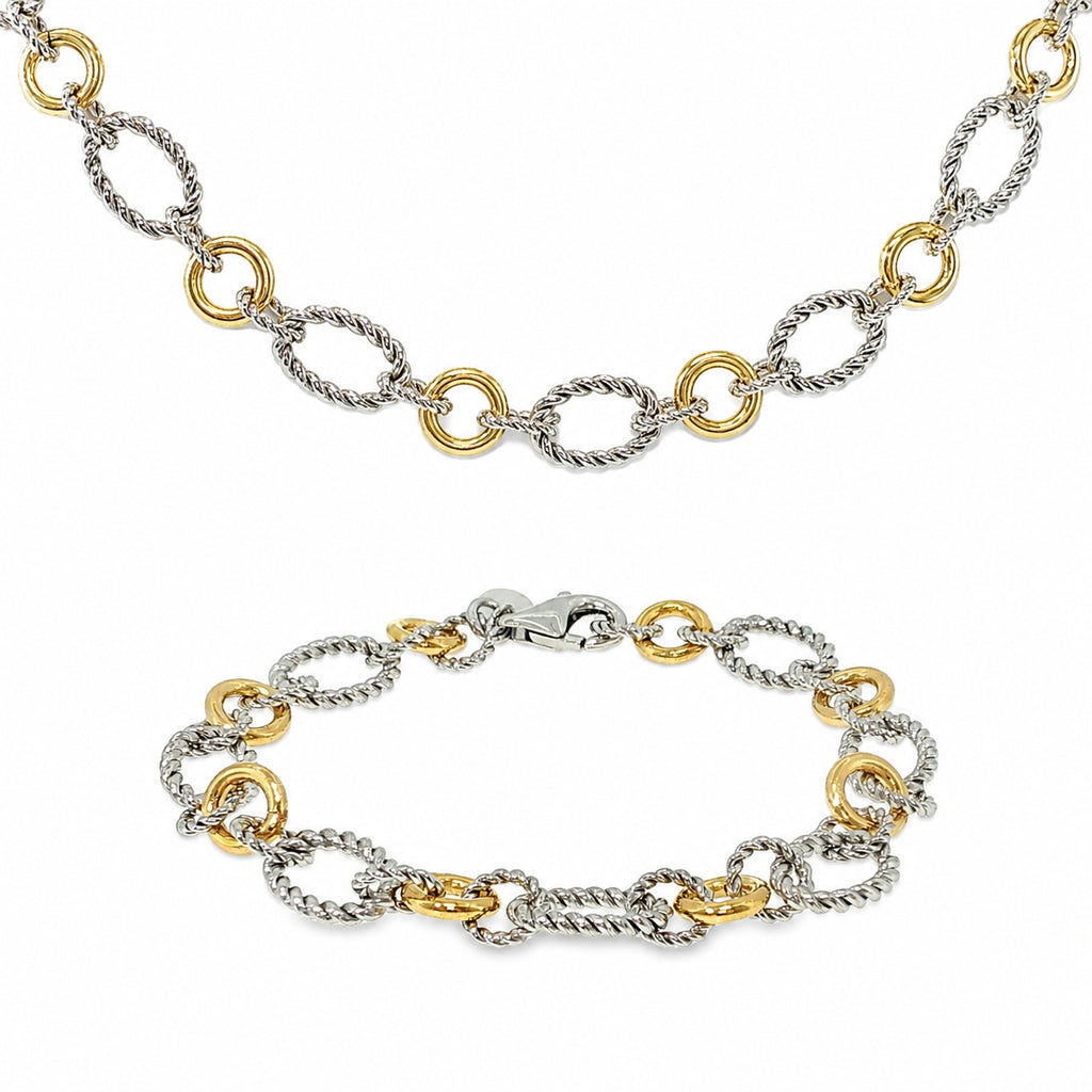 Sterling silver and 18K yellow gold matching necklace and bracelet set with alternating twisted silver links and polished yellow gold circular links.