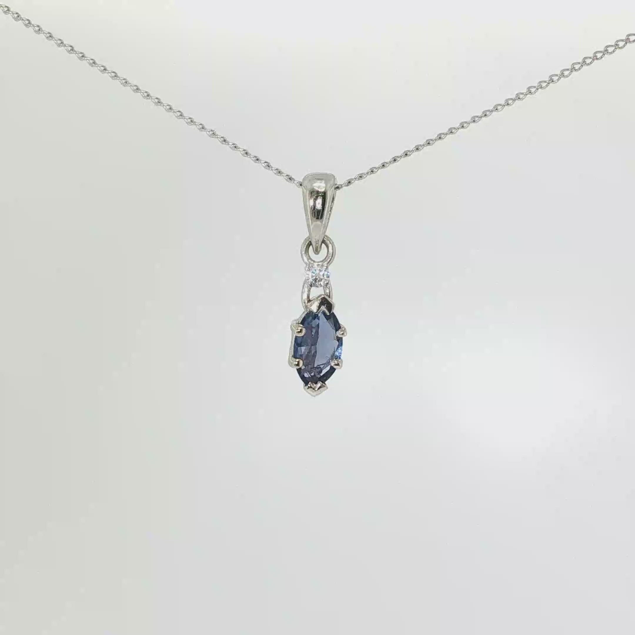 14K white gold pendant with a marquise Montana Yogo sapphire and single diamond accent.
