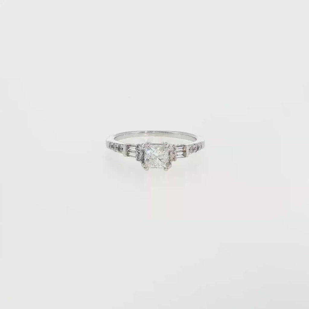 Round Diamond and Tapered Baguette Ring