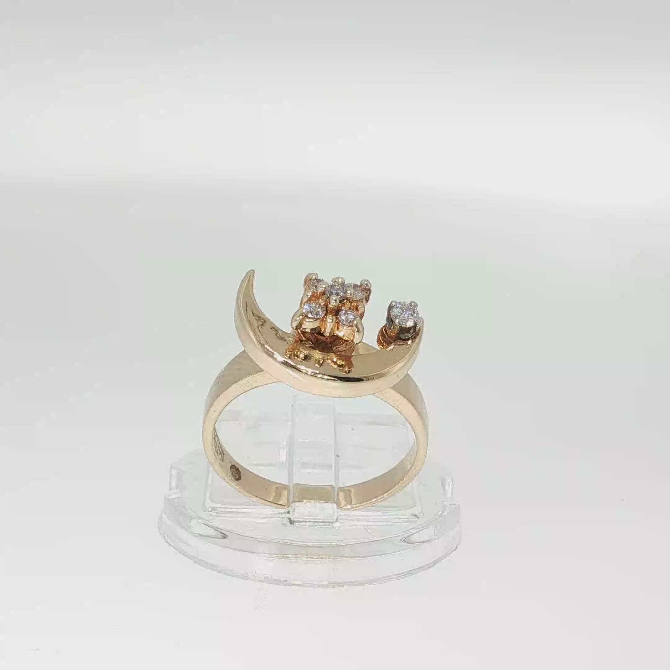 14K yellow gold diamond crescent moon ring with a swiveling moon design and round brilliant diamond accents.