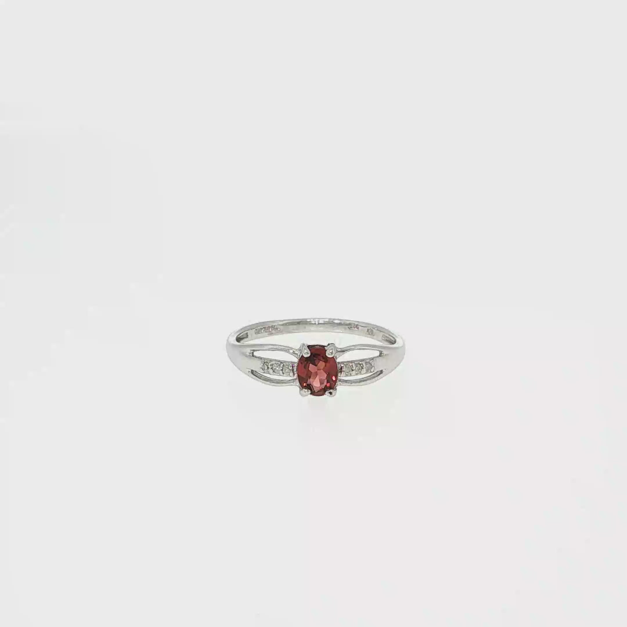 Oval Garnet and Diamond Split-Shank Ring