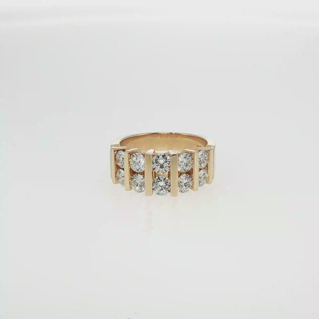 Two-row yellow gold diamond band with 10 round brilliant diamonds and vertical gold bar detailing.