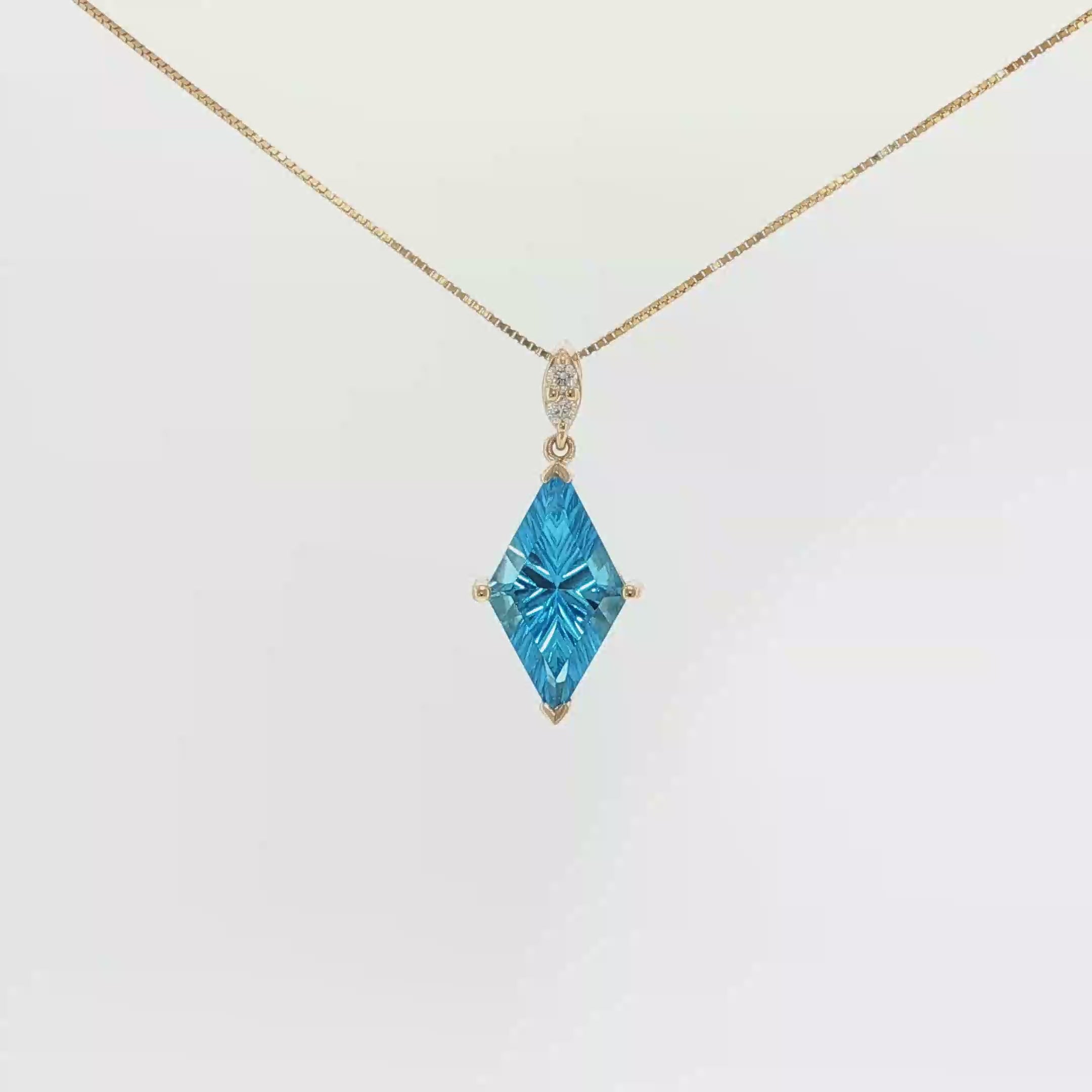 Kite-Cut Swiss Blue Topaz and Diamond Pendant