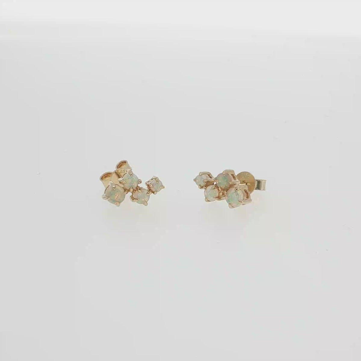 14K white gold scatter-style post earrings with clustered round Australian opals.