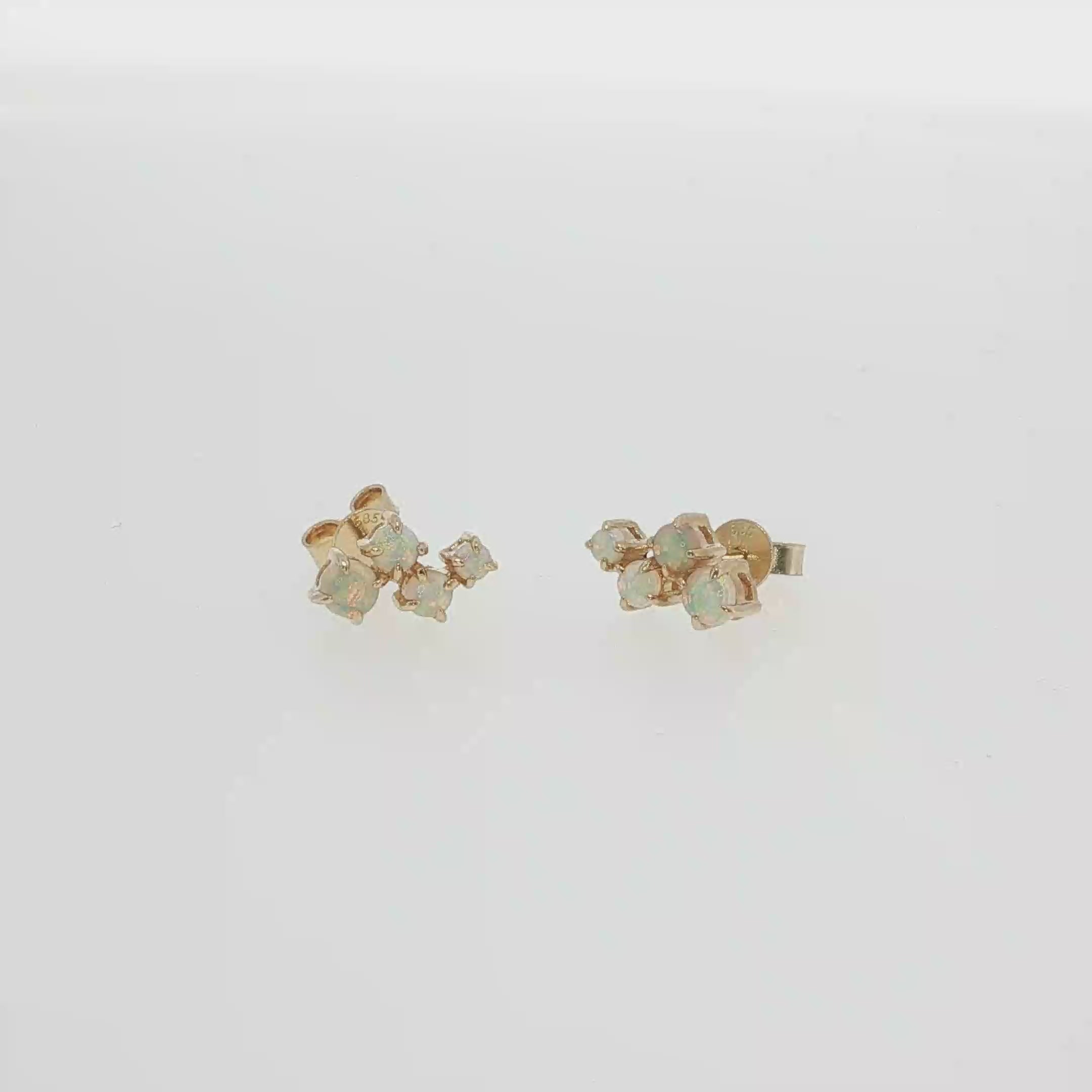14K white gold scatter-style post earrings with clustered round Australian opals.