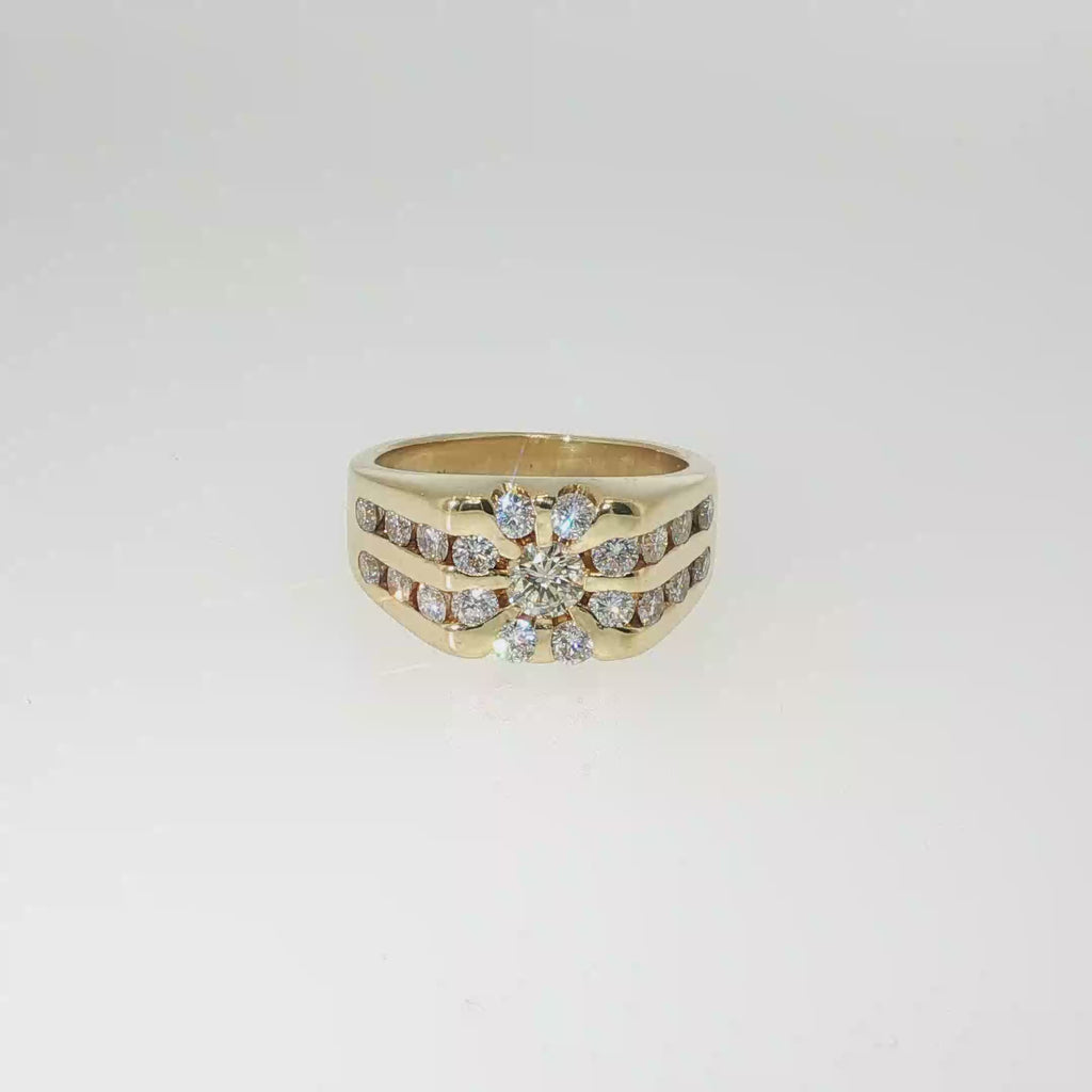 18K yellow gold multi-row band with 21 round brilliant diamonds in a channel-set design.