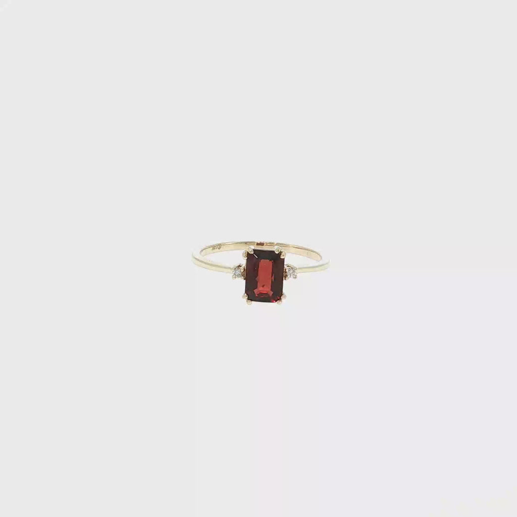 Checkerboard-Cut Garnet and Diamond Three-Stone Ring