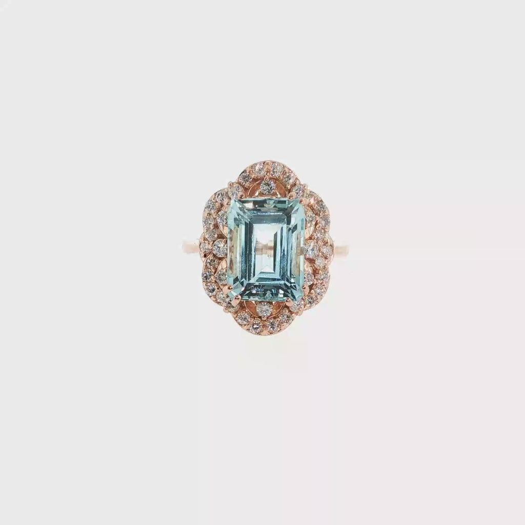 Emerald-Cut Aquamarine and Diamond Halo Ring