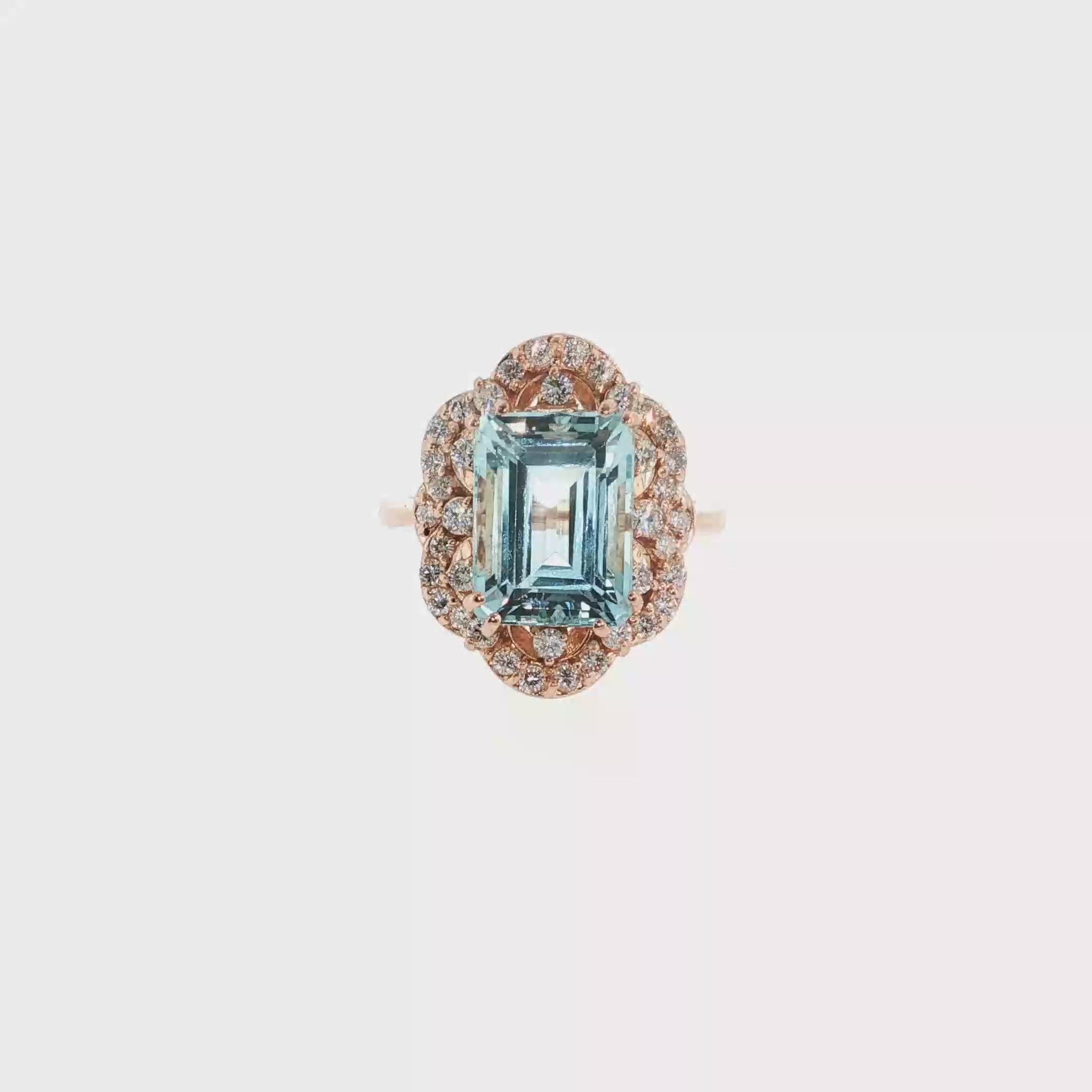 Emerald-Cut Aquamarine and Diamond Halo Ring