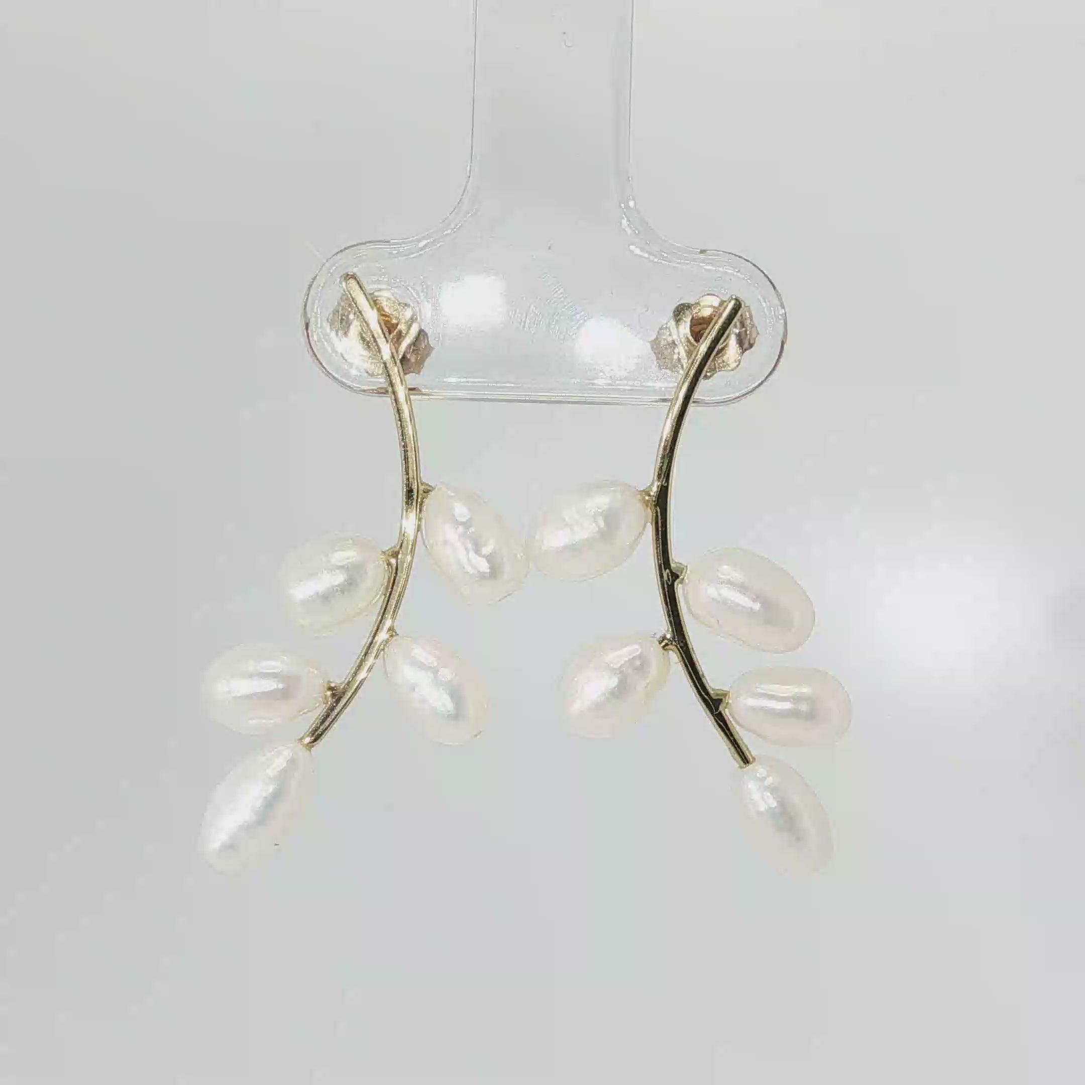 14K yellow gold branch-style drop earrings with 10 freshwater pearls.