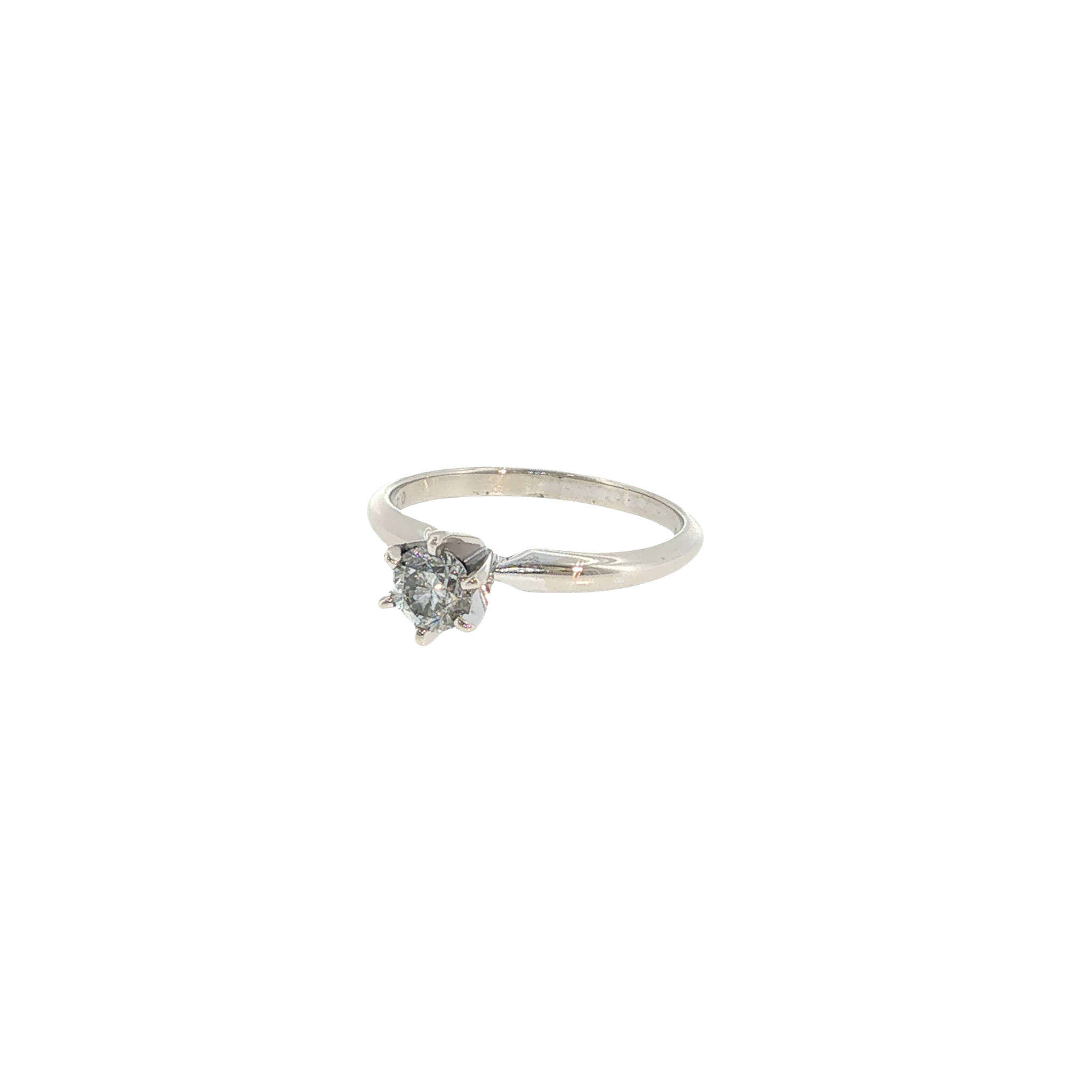 14K white gold solitaire ring with a round diamond held in a classic six-prong setting.