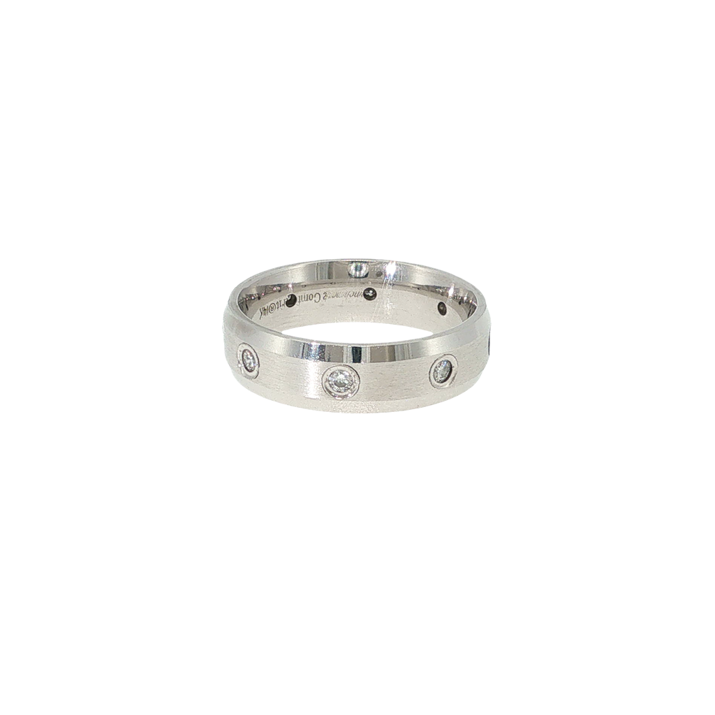 14K white gold comfort-fit band with beveled edges and eight flush-set round brilliant diamonds.
